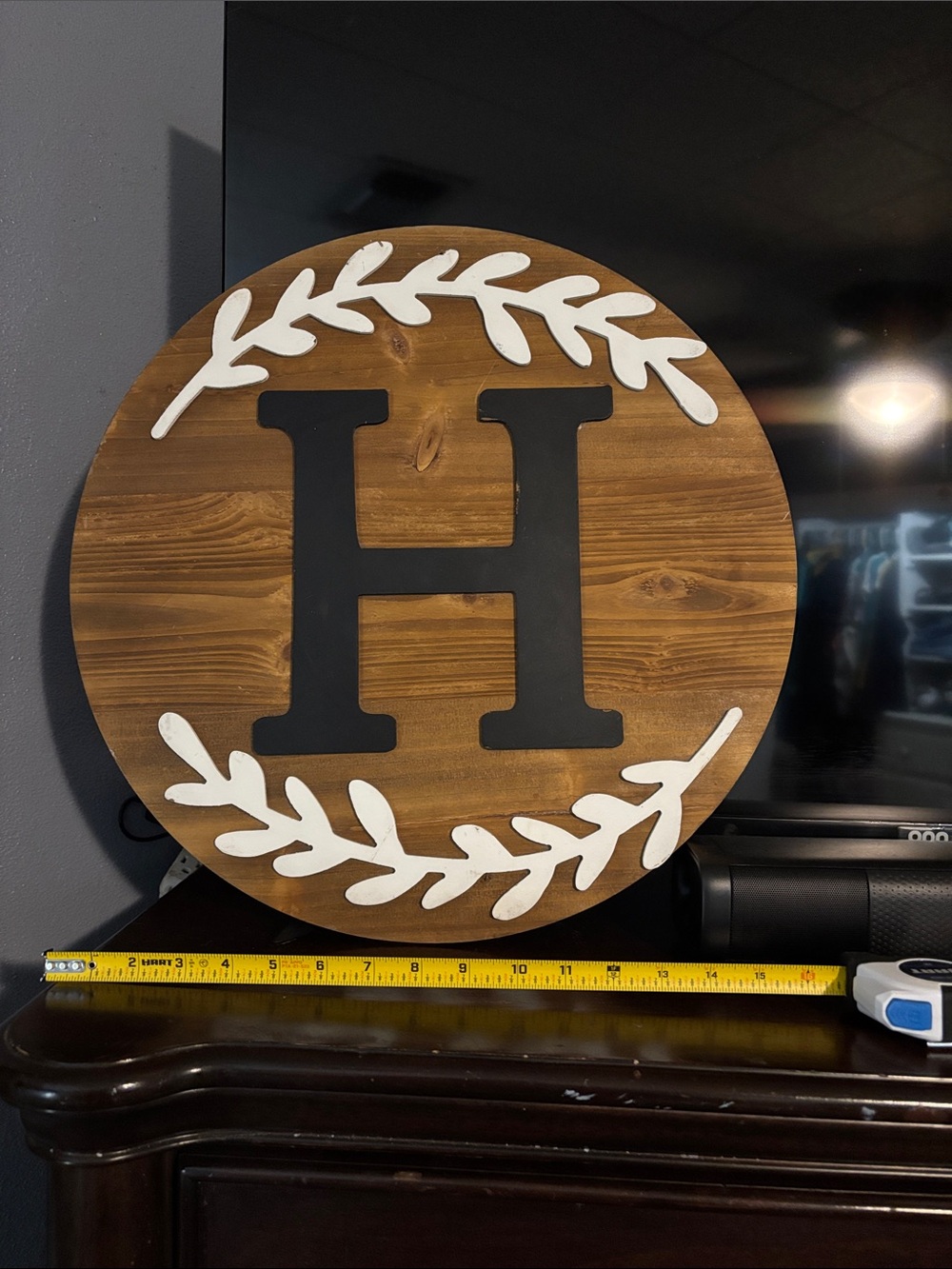 Kirklands Rustic Wood Round Sign with Black Monogram and White Laurel